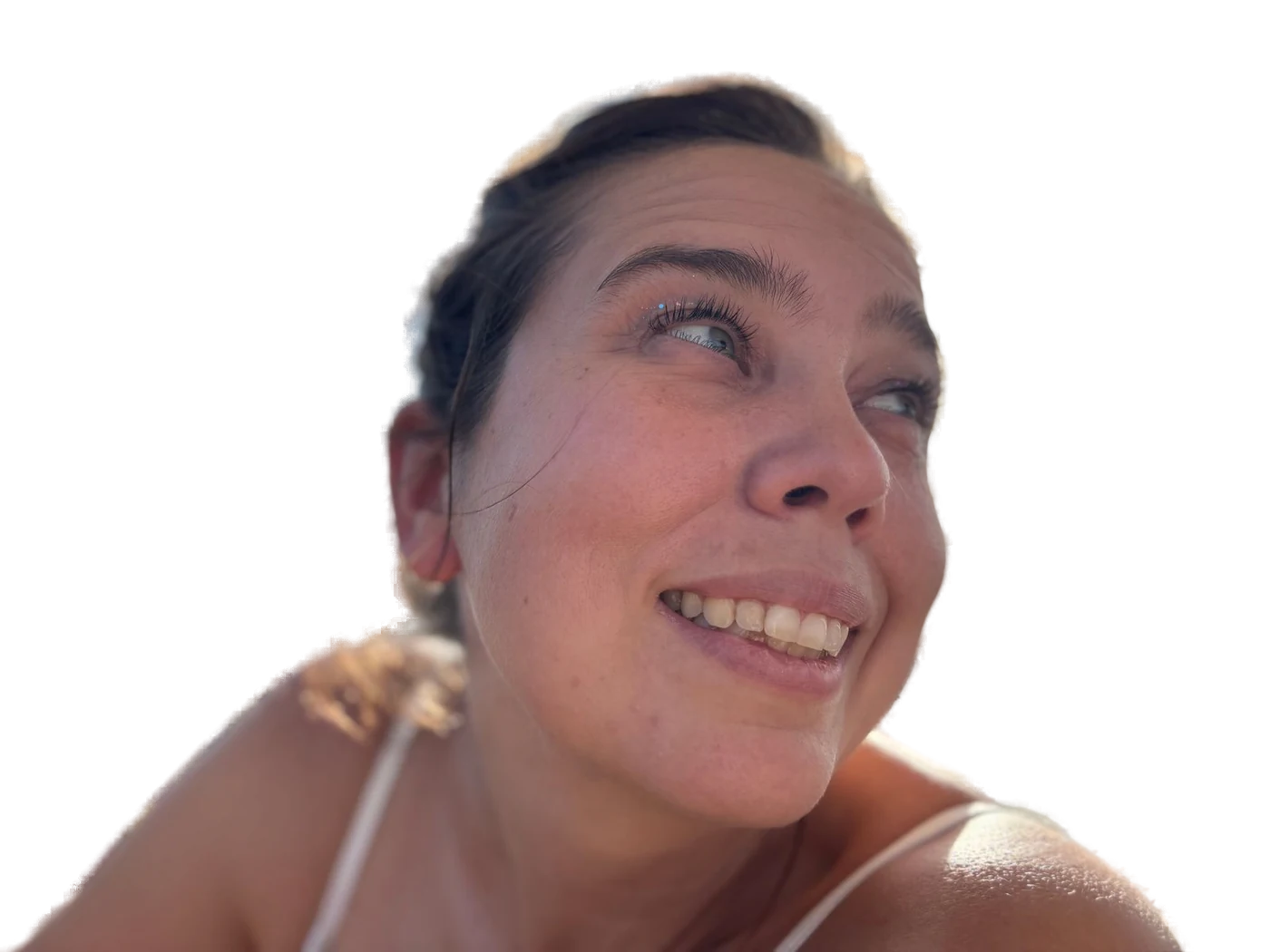 Jessikers smiling outside beneath a bright sky